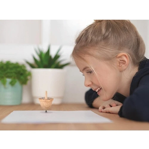 tekentol-patronen-tekenen-steam-gyroscoop Educatief speelgoed in gebruik: kind observeert een draaiende PhänoMINT tekentol