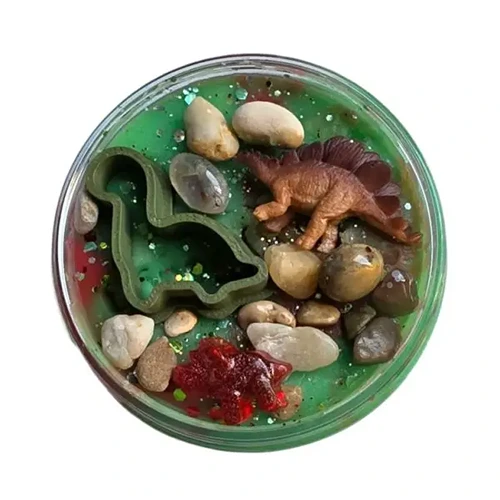 Pot sensorydough dino's van bovenaf met beeld op speelfiguren